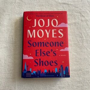 Red 'Someone Else's Shoes' Book by Jojo Moyes